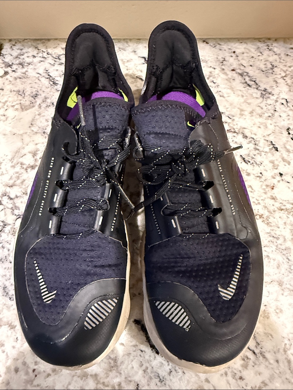 Nike Women's Black Sneakers with Purple and Neon Green Accents